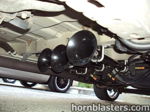 Low-angle triple black train horns U-bolt mount chrome rim tire underside Leonard's 2003 Dodge Caravan 232 gallery photo 4