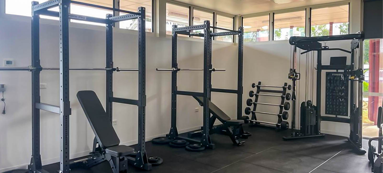 High School Gym Fit Out at St. George State featuring two Power racks and the Force USA Functional Trainer