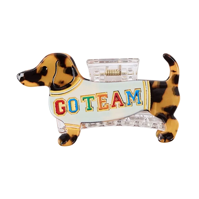 Dachshund figurine wearing a 