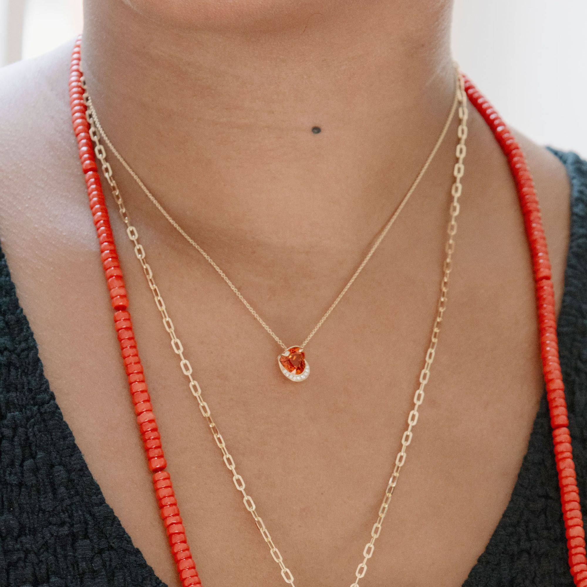 orange garnet and diamond pendant
