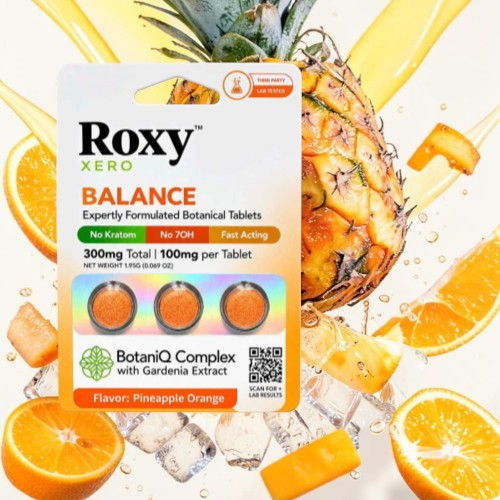 Roxy Balance botanical tablets with pineapple and orange slices in a splash background.