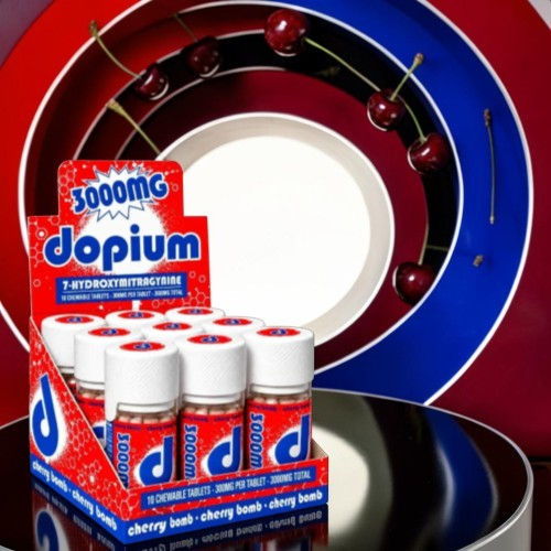 Dopium energy drink display with red and blue background.