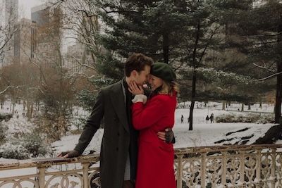 kissing engaged couple, wintertime central park