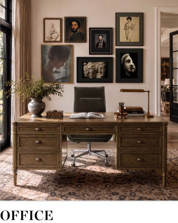 Home office with a desk, chair, and wall art.