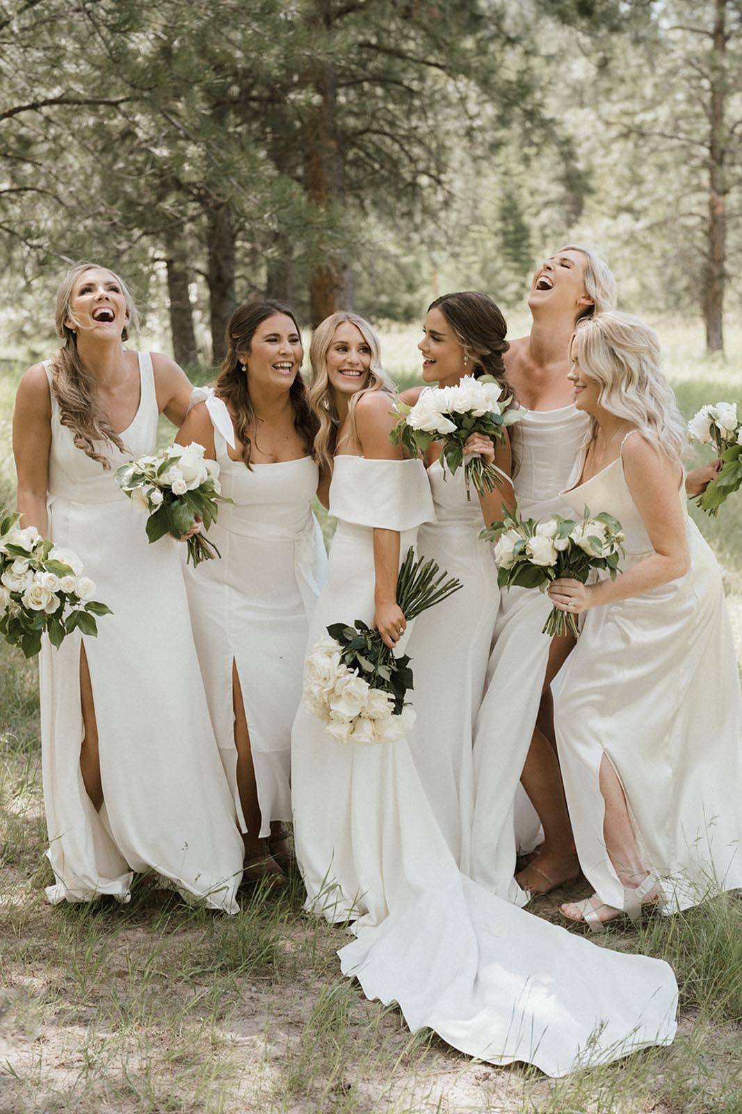 Bride, having fun with her bridesmaids