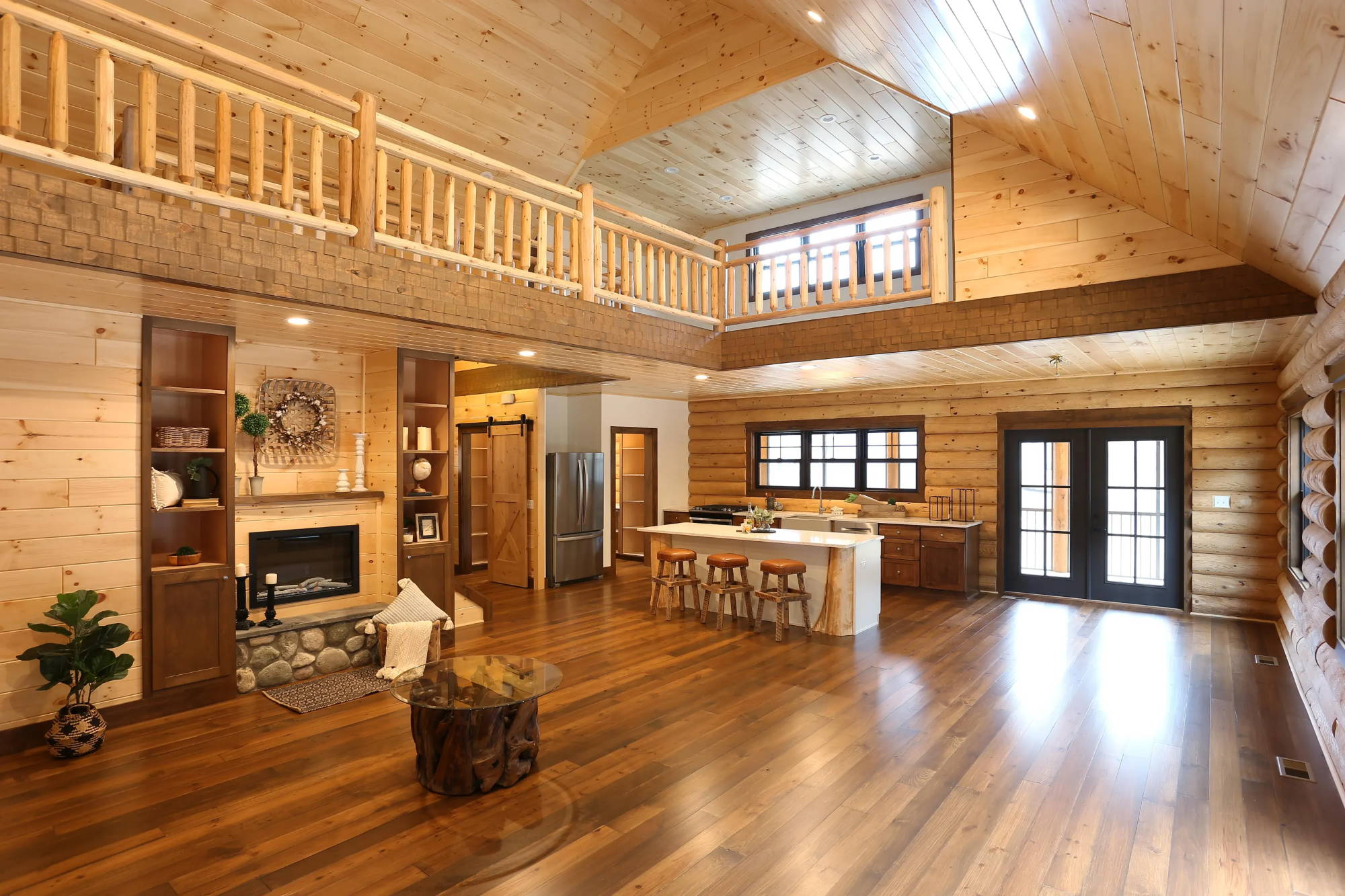 Interior of white cedar log home in Spring Lake, MI with pine tongue and groove.