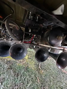 Close-up of underbody train horn brackets