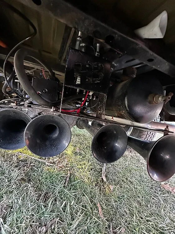 Close-up of underbody train horn brackets