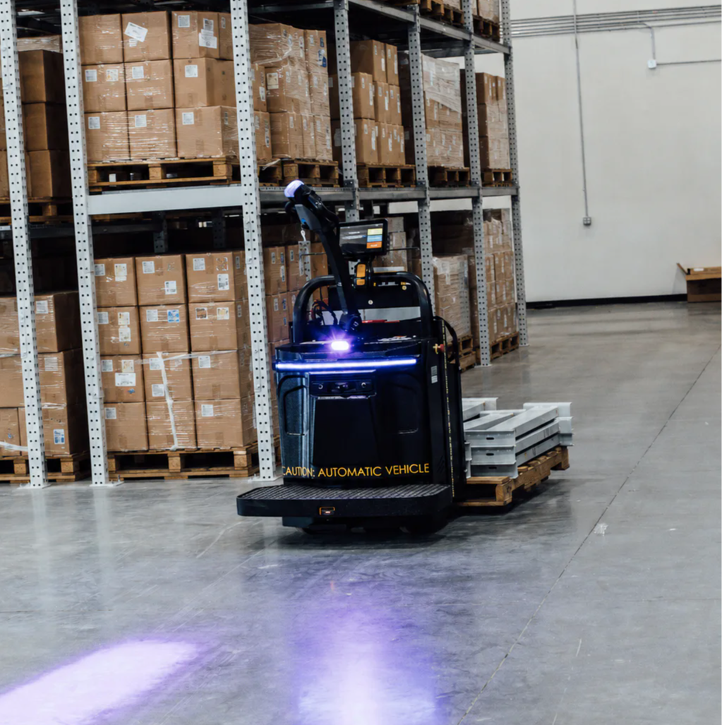 AGV Transporting goods through a warehouse