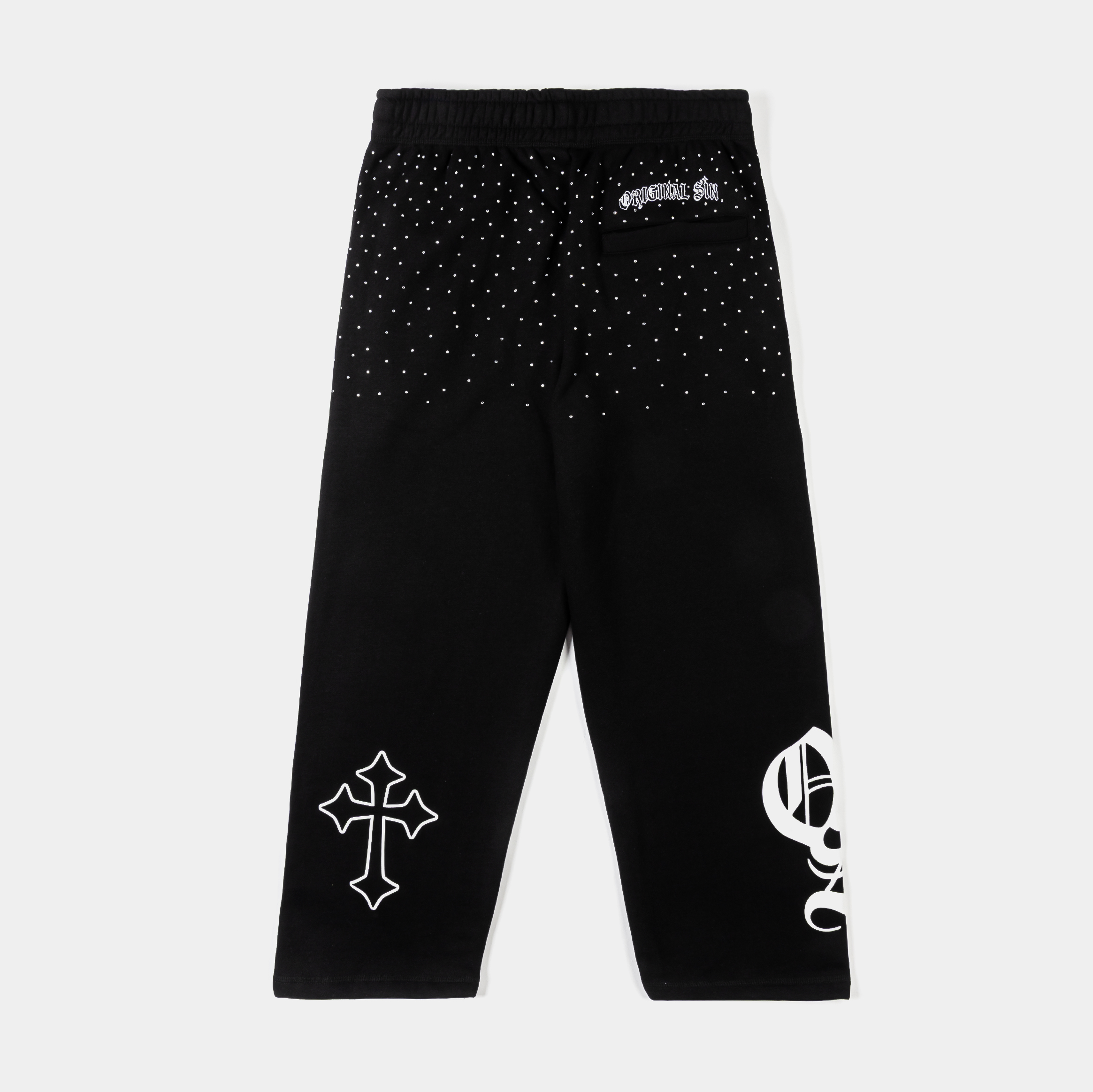 Black pants with various graphic designs and text.