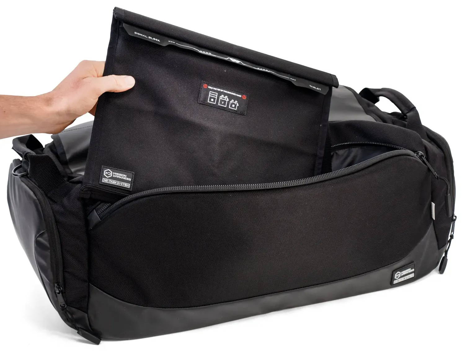 Removing the Disconnect tablet Faraday sleeve from the duffel via the MD-Tach zipper seam