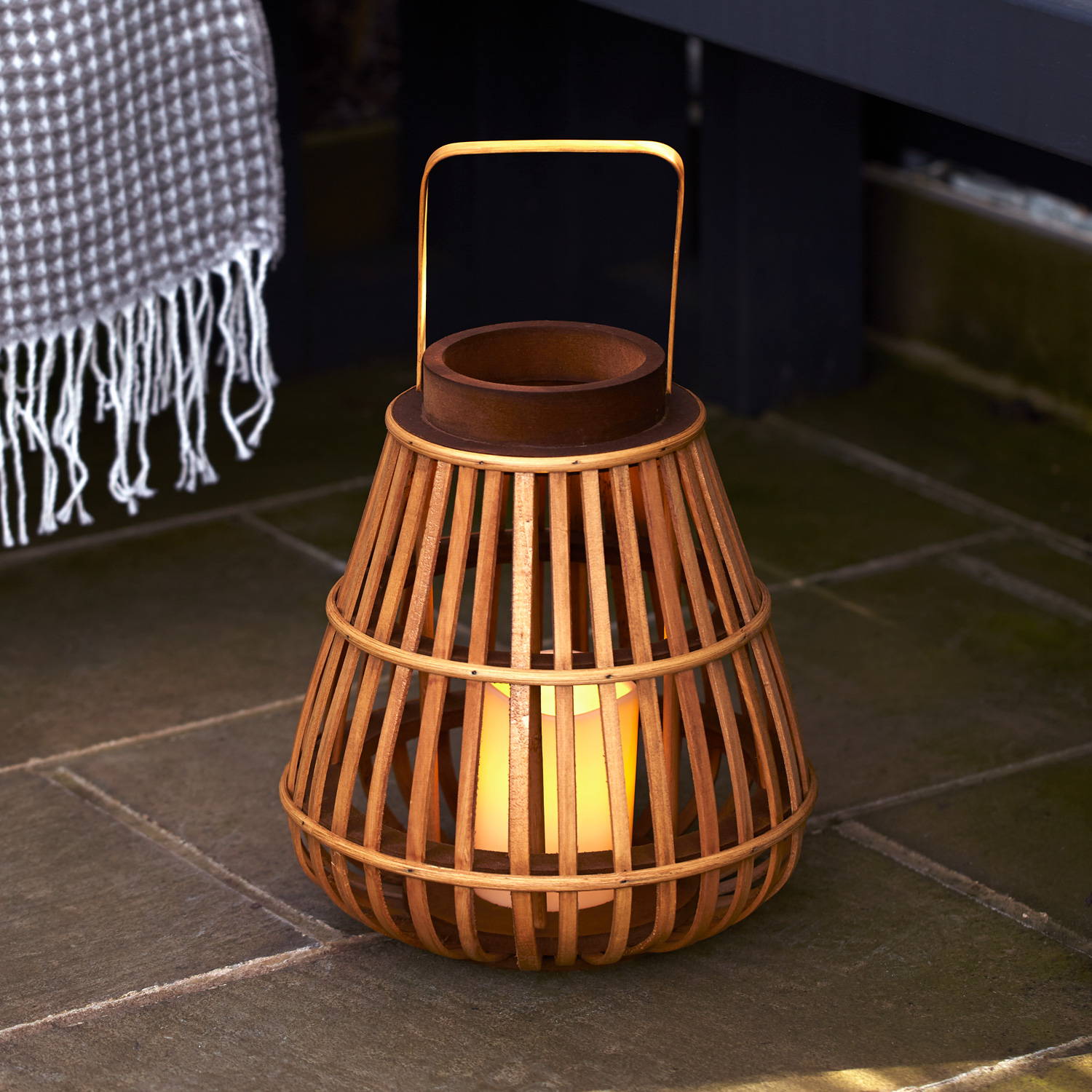 Garden patio displaying a rattan lantern