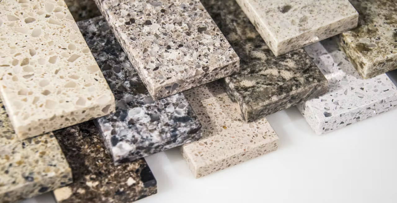 A stack of samples of various types of countertops