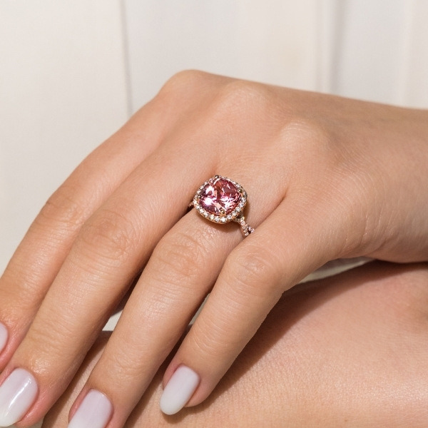 gorgeous vintage style rose gold diamond accented engagement ring with large cushion cut pink lab grown sapphire center stone