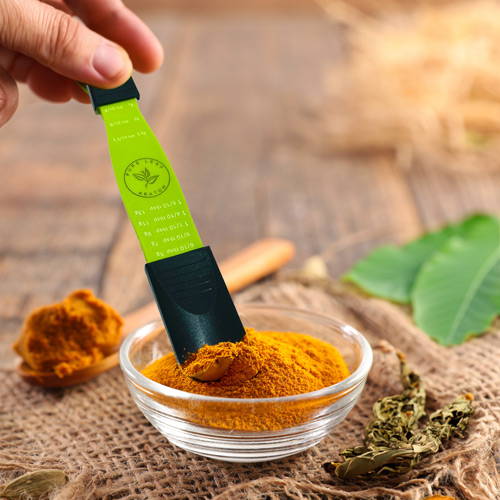 Pure Leaf Kratom Adjustable Measuring Spoon dipped in Kratom Powder