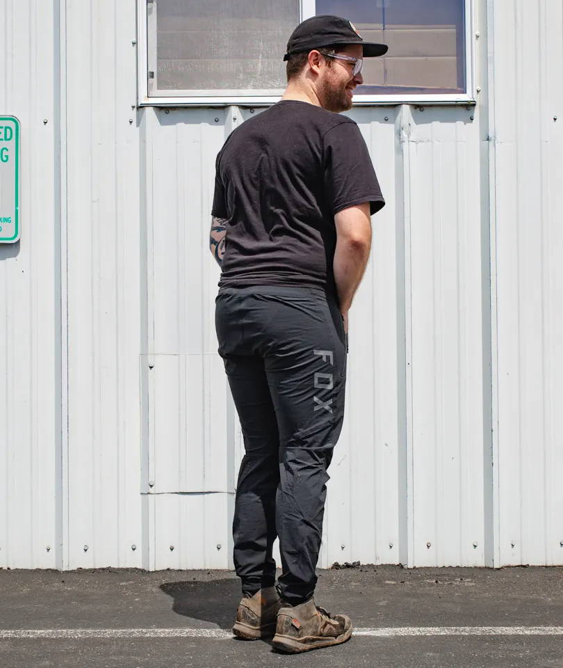 image collage of colin wearing the fox flexair mountain bike pants in black against a white wall