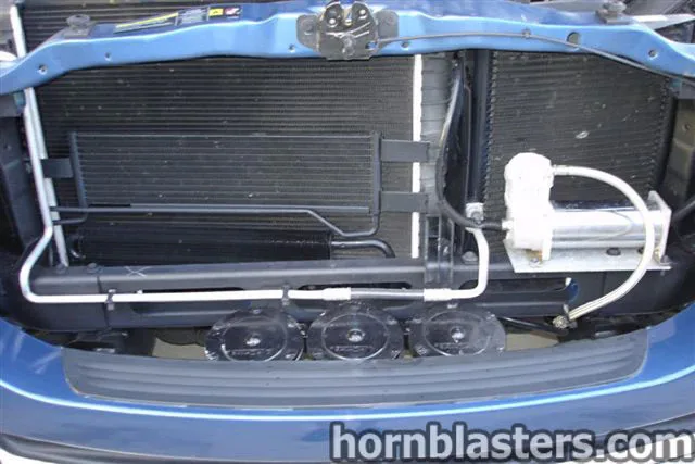 Front-side view of Brian's 2006 Dodge Ram 1500 train horn installation