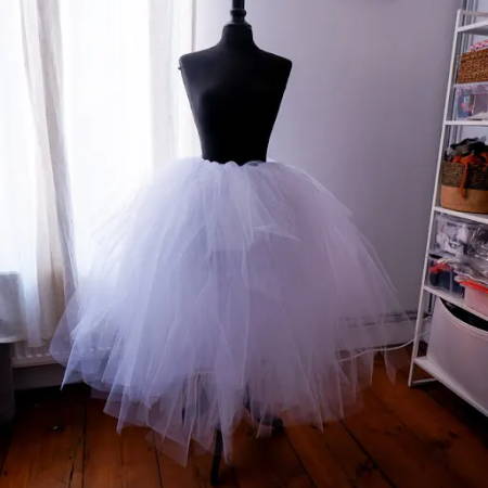 A diy white tulle skirt on a mannequin