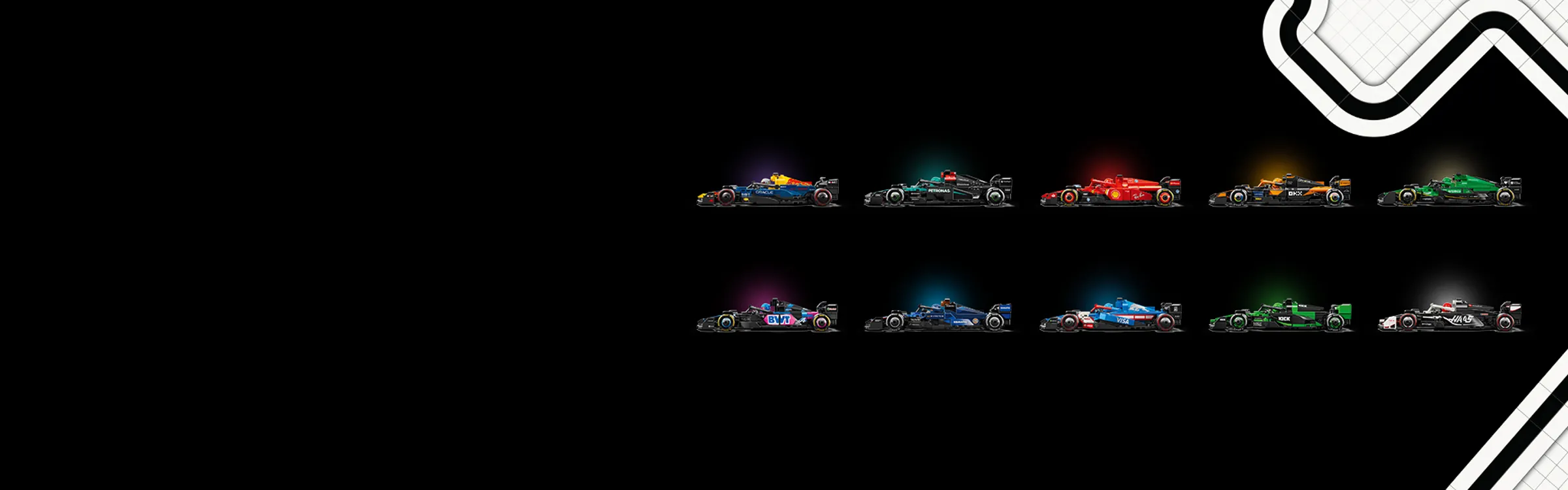 Colorful racing cars lined up against a black background.