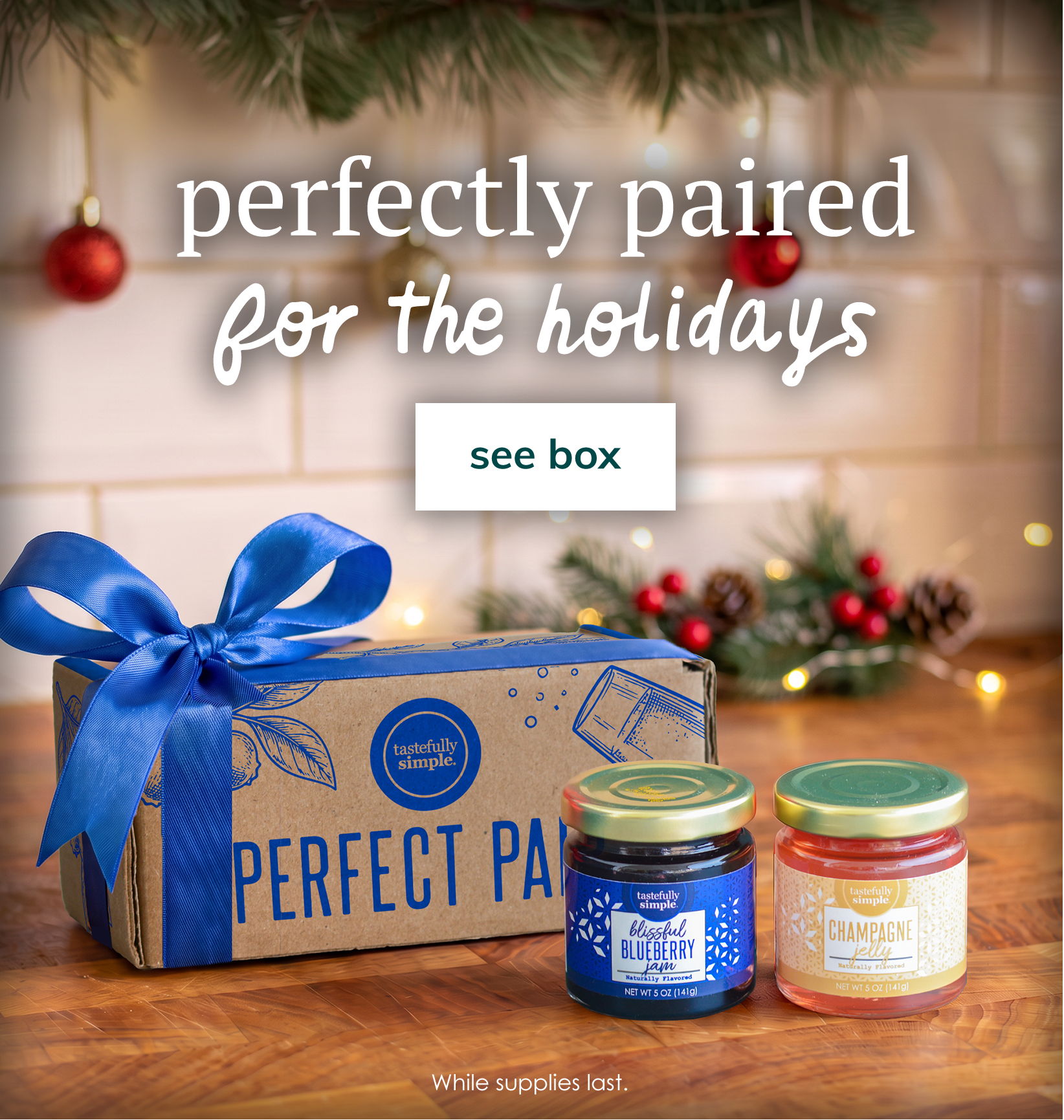 Perfectly paired for the holidays. Gift box with two jars of jam and a blue ribbon. See box.