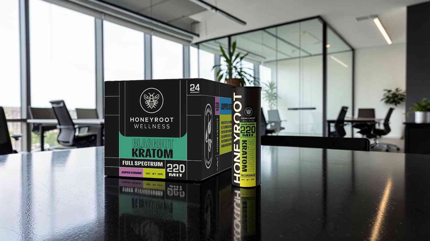 A box and a can on a table in an office setting.