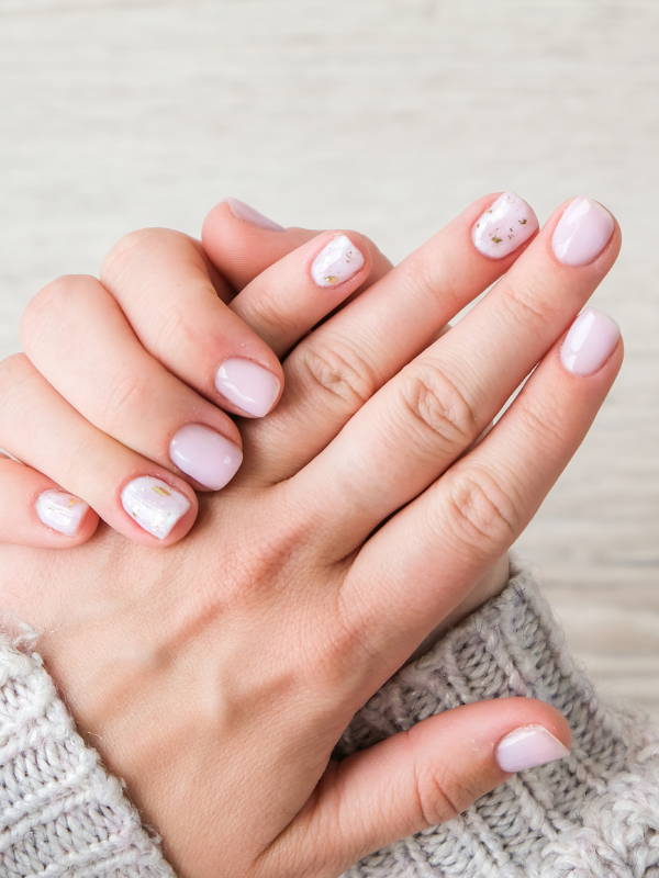 A person maintaining healthy nails. 