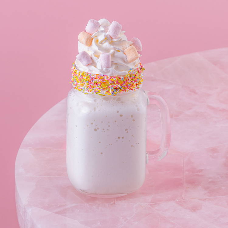 Vanilla frappe shake on pink background