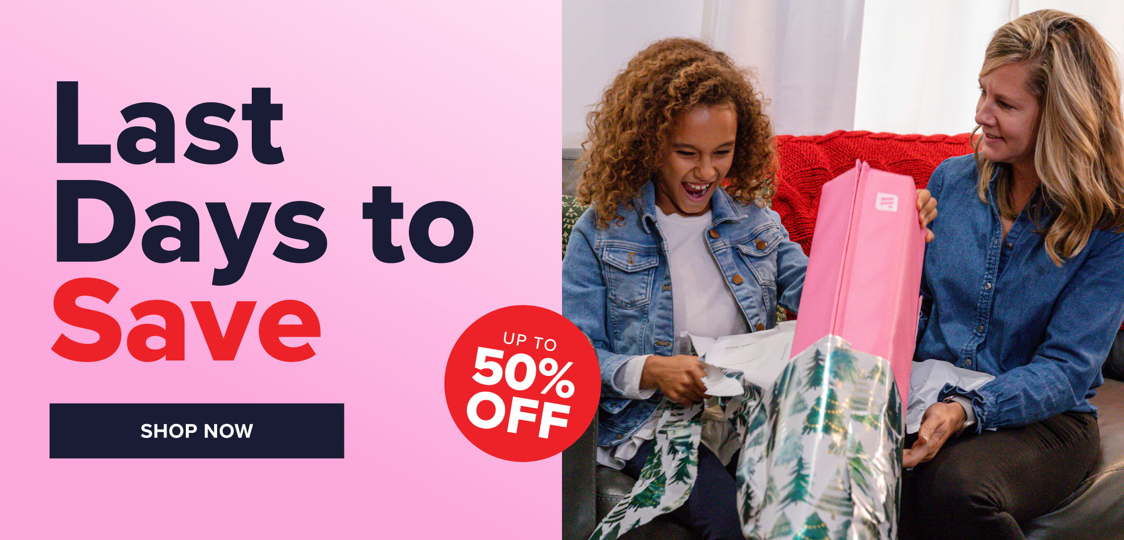 Two women excitedly unwrapping a gift, promotional text about a sale.