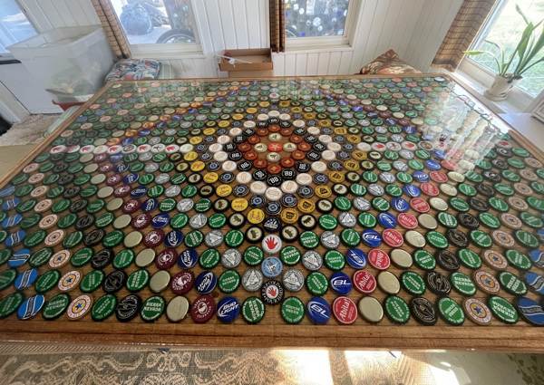 An epoxy bottle cap table top