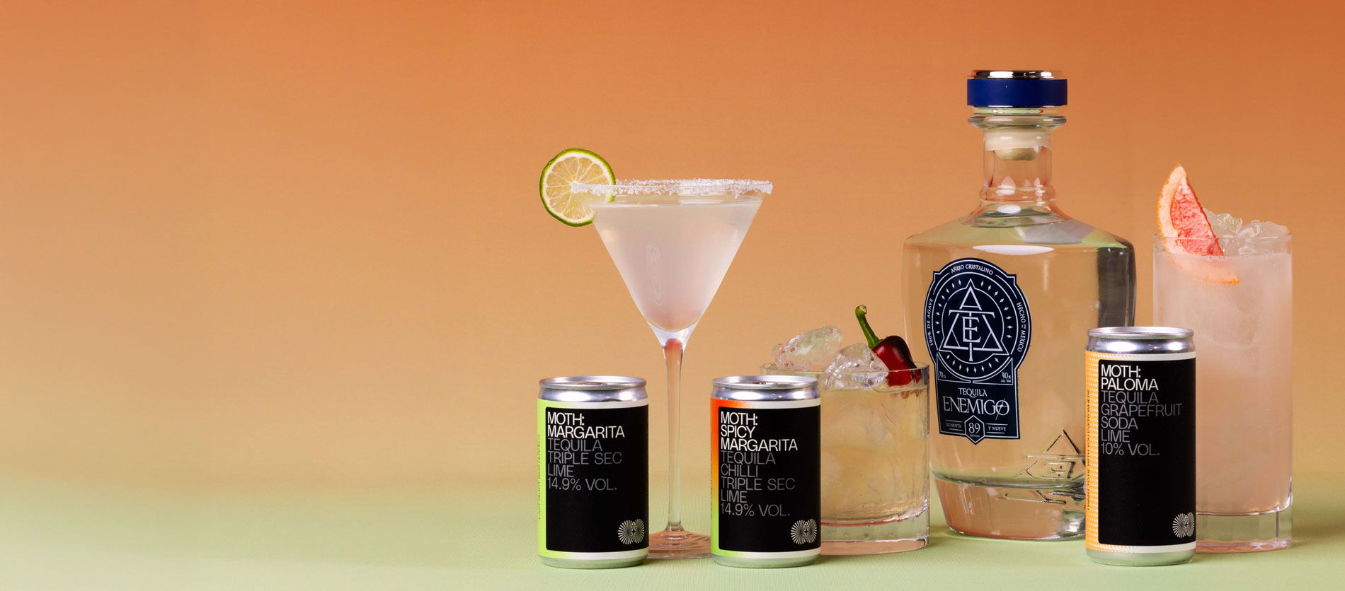 Bottles of tequila and cocktails on a colorful background.