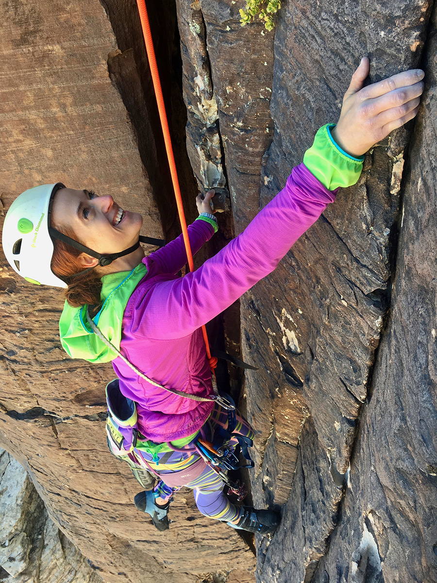 smiling female climber