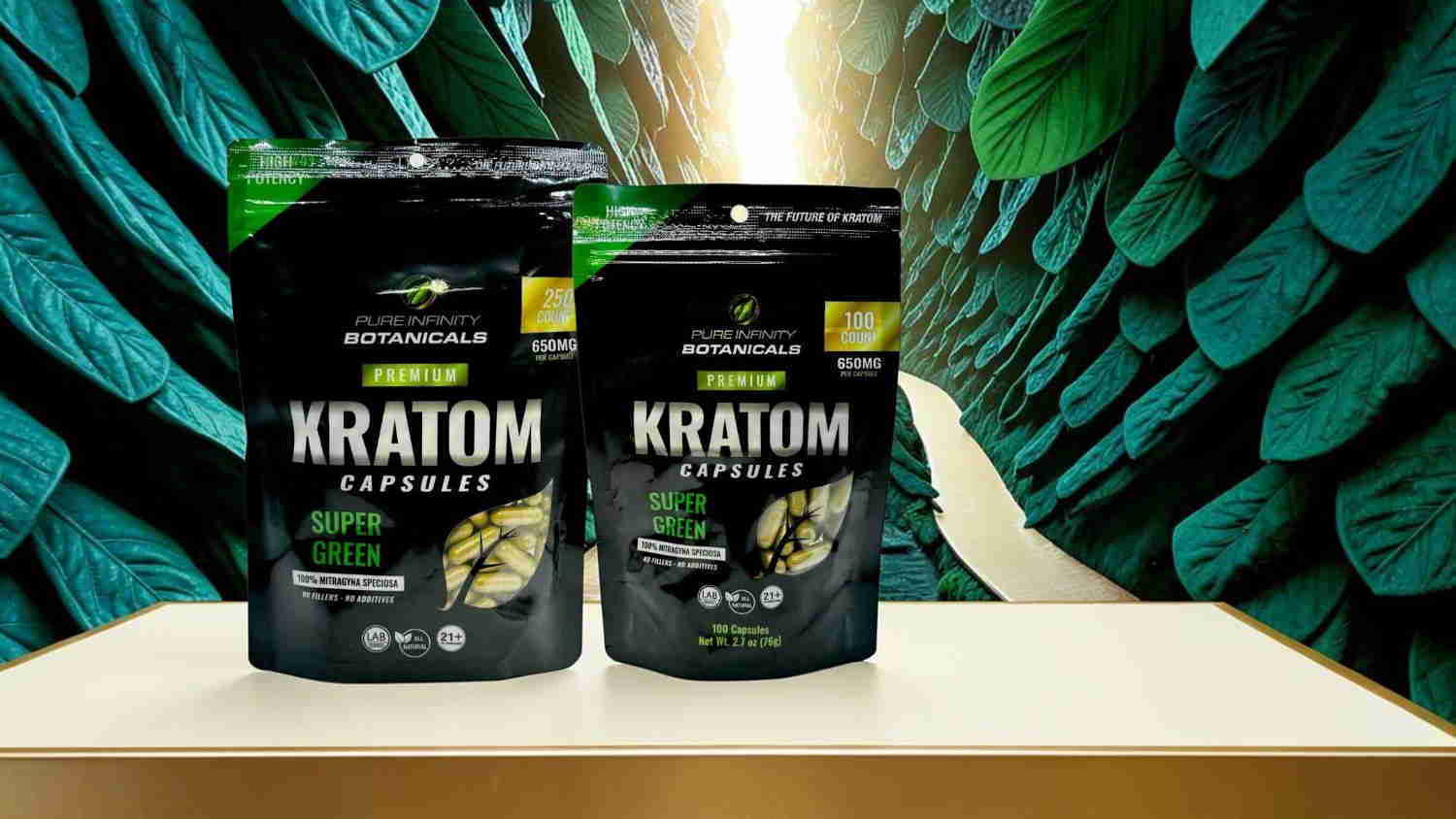 Two packages of Kratom capsules and powder on a table.