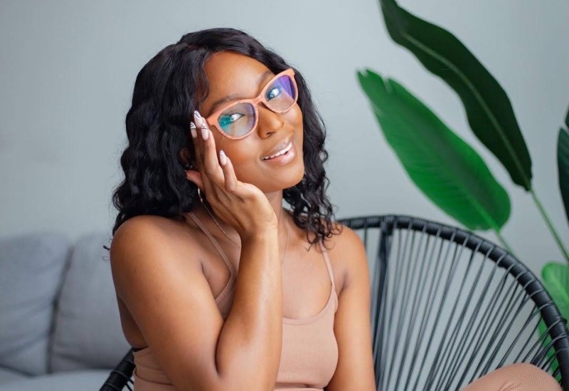 woman wearing Charm Rose eyeglasses from Kraywoods glasses collection