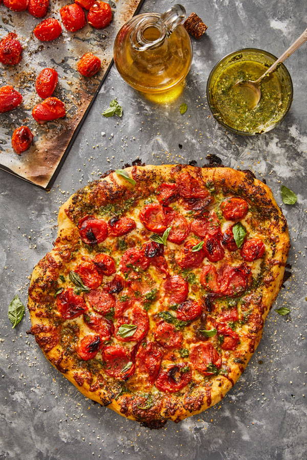 Pesto pizza with charred cherry tomatoes recipe