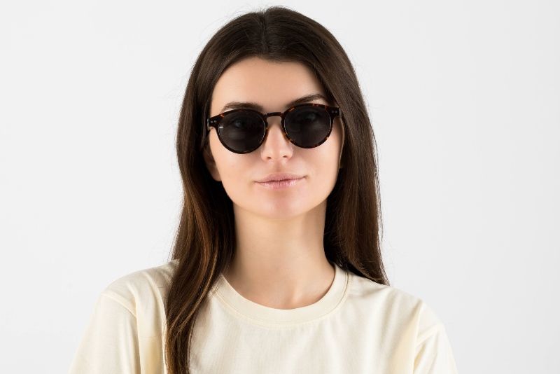 woman wearing Trevor prescription sunglasses on a white background