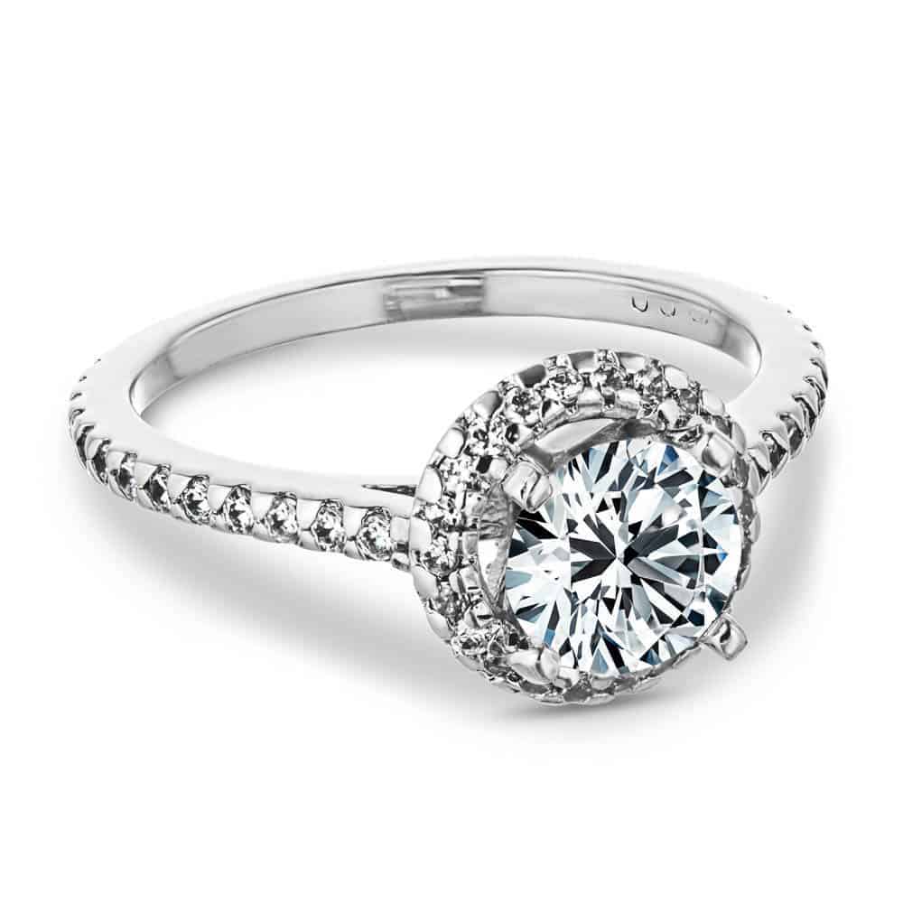 diamond accented halo engagement ring Shown with a 1.0ct Round cut Lab-Grown Diamond with a diamond accented halo and band in recycled 14K white gold