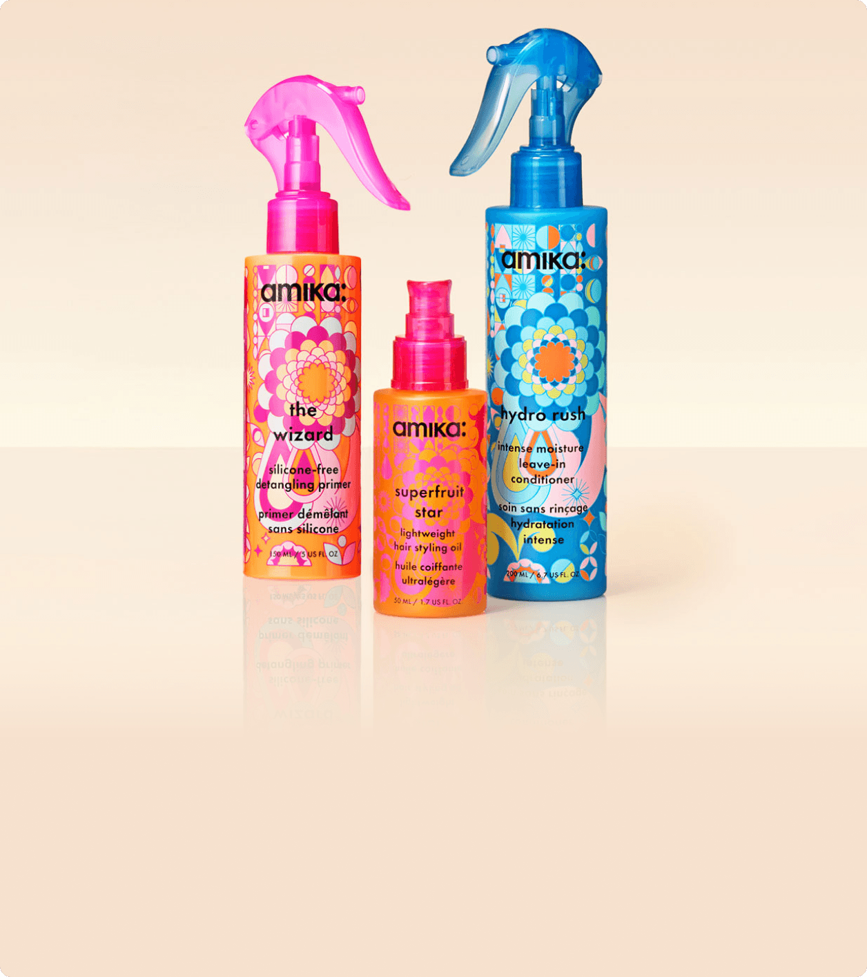 Three colorful hair care product bottles on a light background.