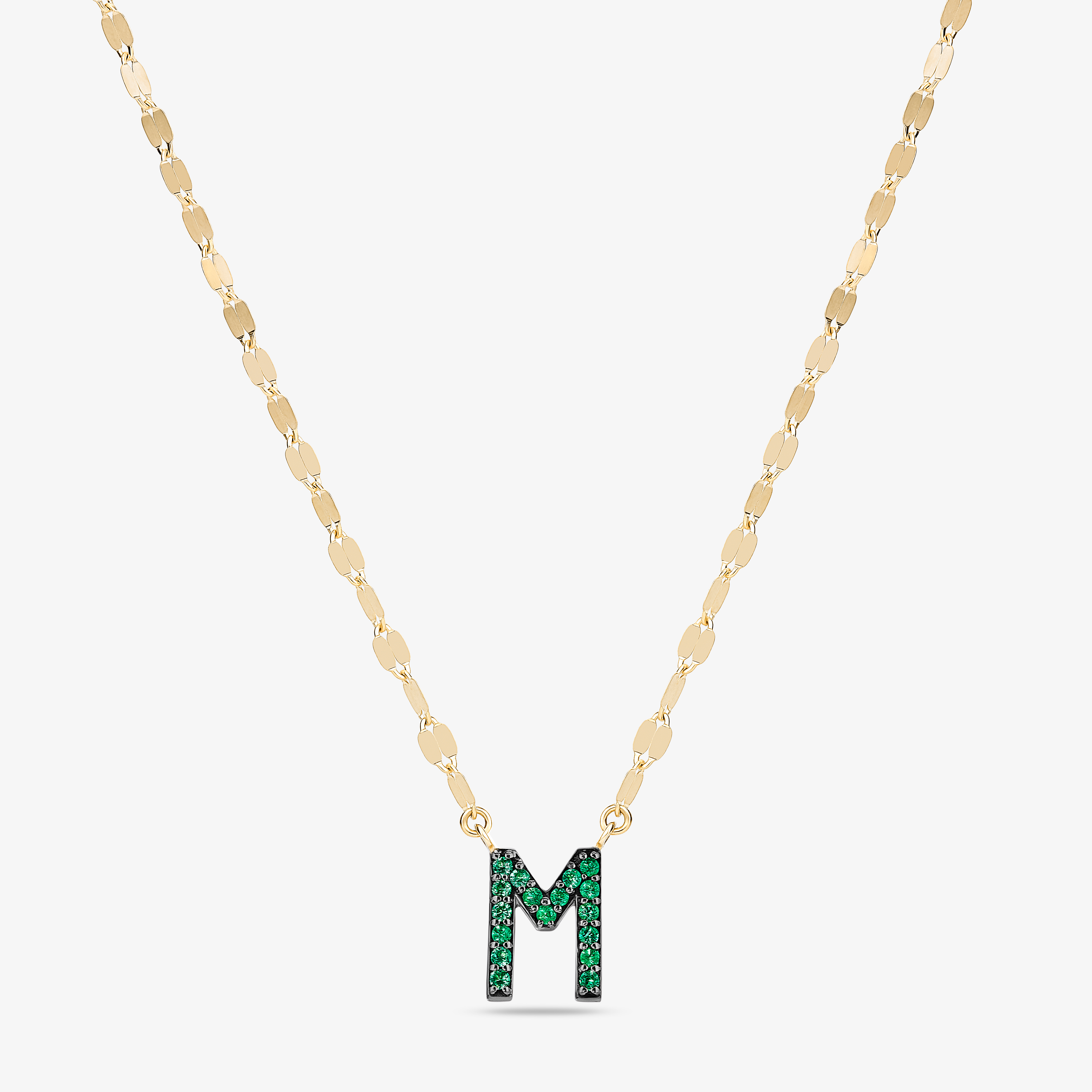 Gold chain necklace with a Y-shaped design.