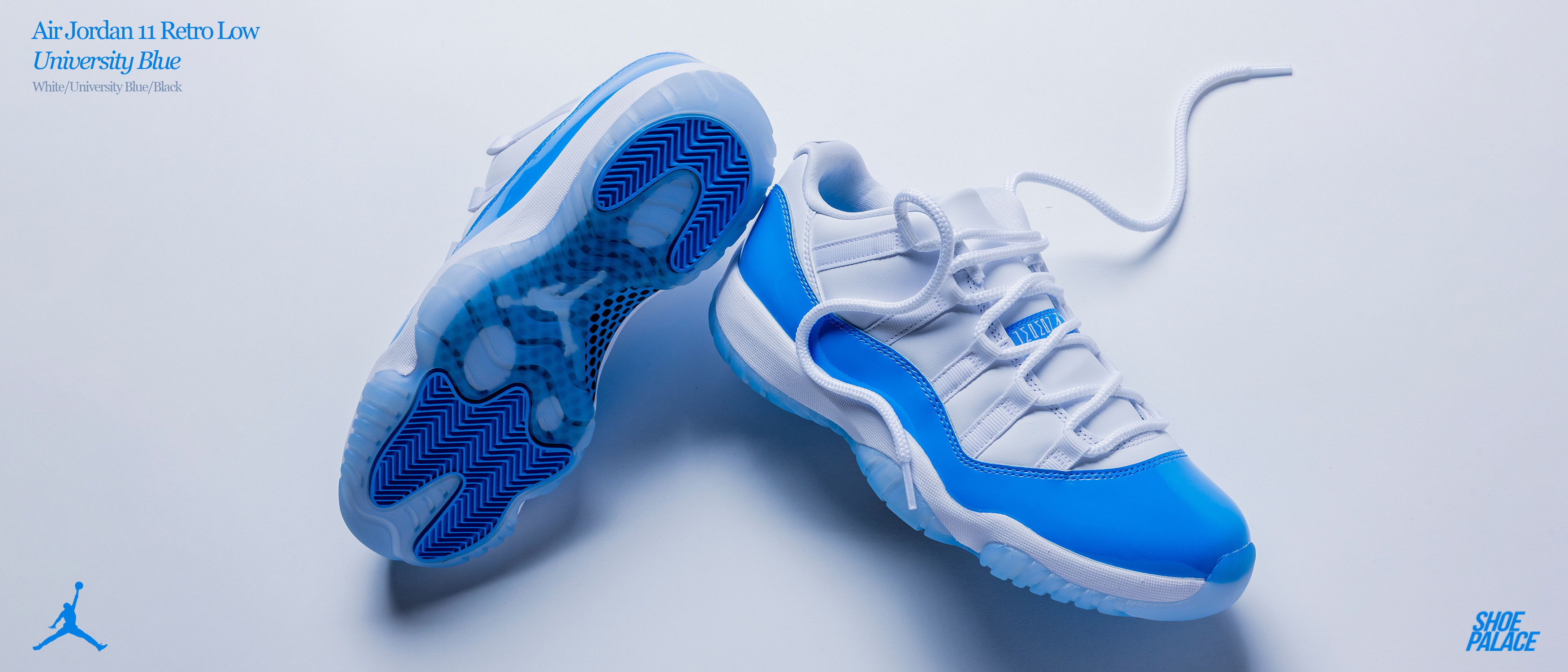 A pair of blue and white sneakers on a light background.