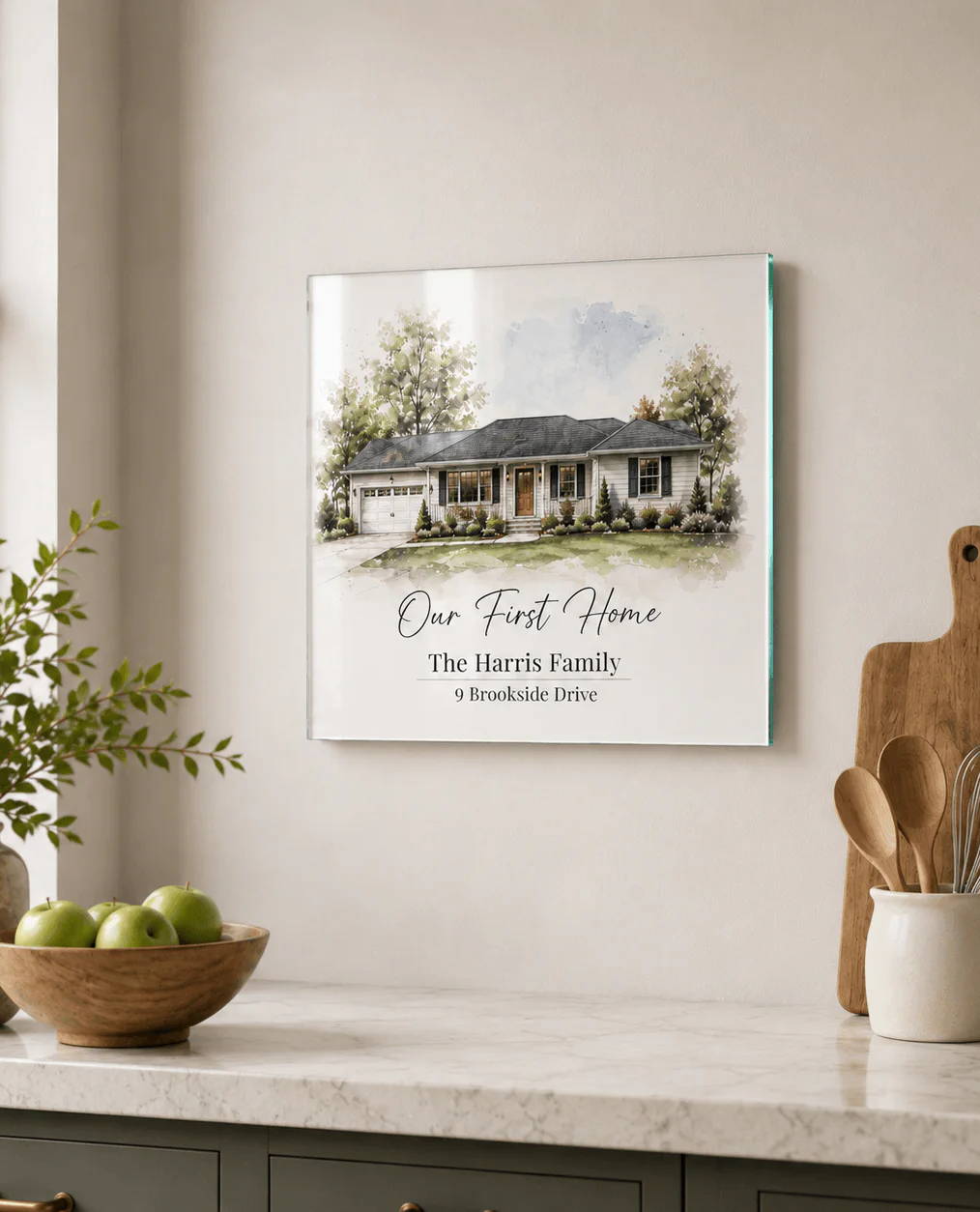 A framed family home sign on a kitchen wall with decorative elements.