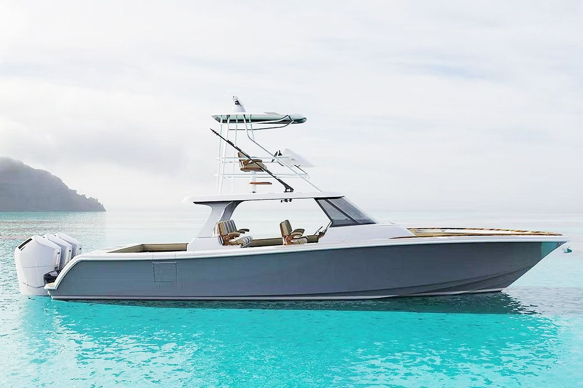 Luxury center console boat floating in crystal clear turquoise ocean water under a bright coastal sky, showcasing the offshore boating and sportfishing lifestyle.