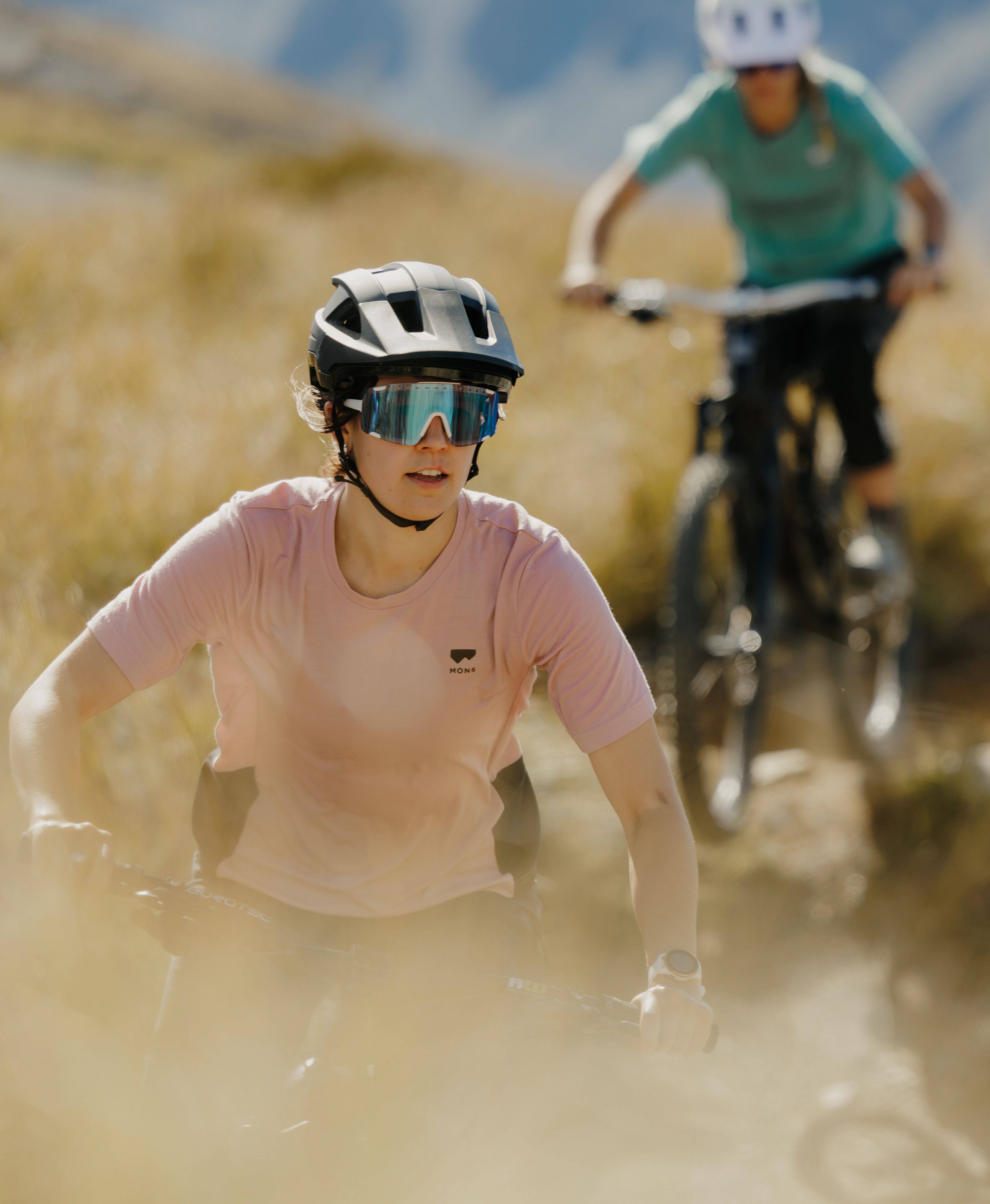 Mountain bikers wearing Glade Stash sunglasses