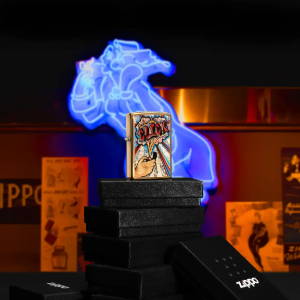 Lifestyle image of Zippo Click Brushed Brass Windproof Lighter, standing on a tower of lighter boxes with a neon Windy in the background with Zippo posters.