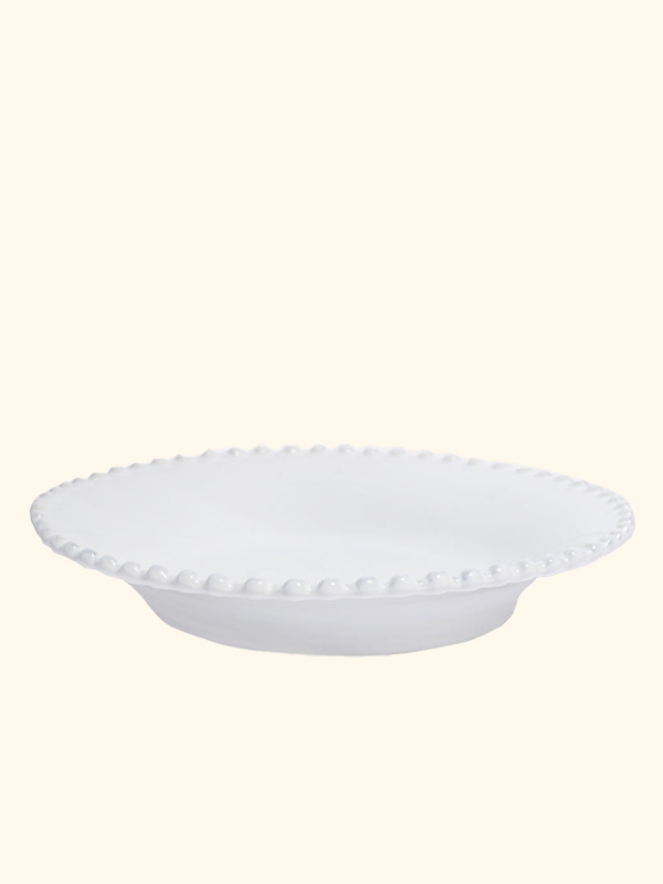 A product picture of a Costa Nova Pearl White  Soup Plate.