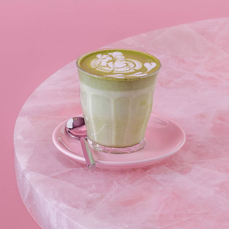 Matcha Jade, green latte on pink background