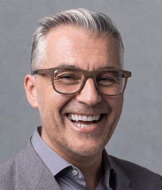 old man looking younger wearing Brave Brown wooden eyeglasses