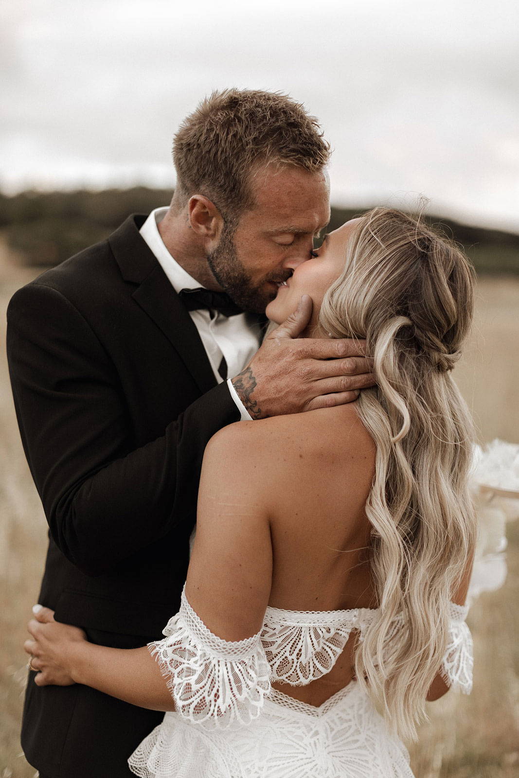 Bride and groom sharing a kiss