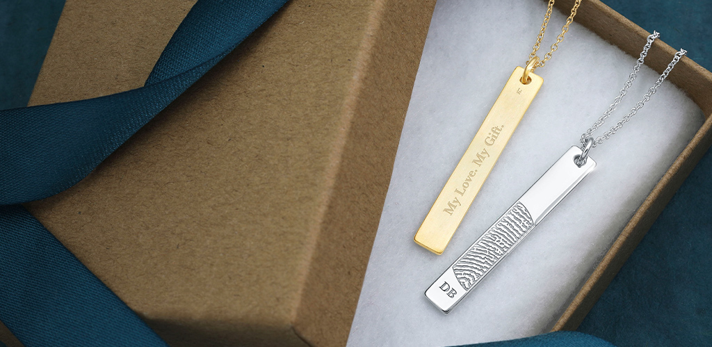 vertical bar pendants engraved with a fingerprint