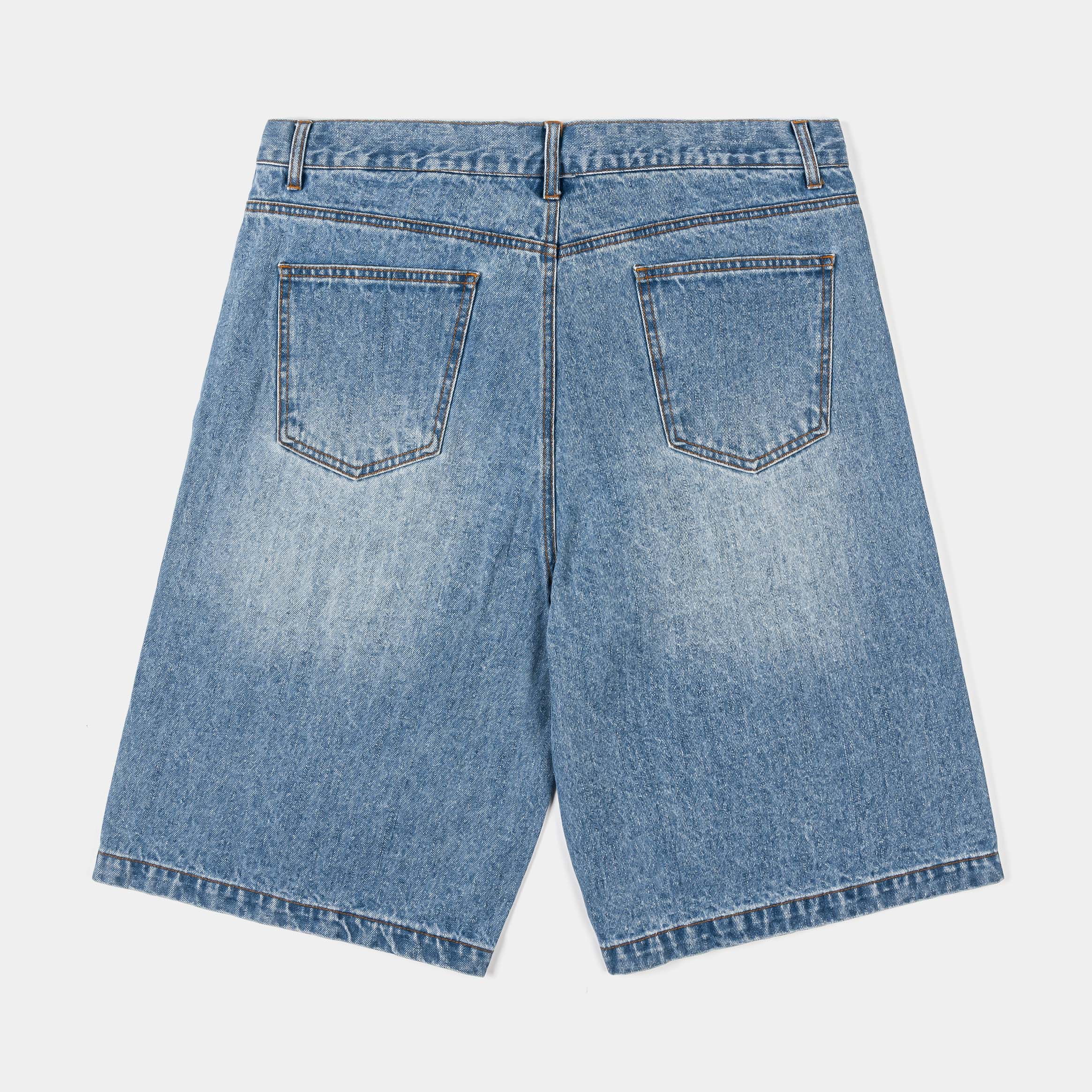 Denim shorts with graphic prints and distressed details.