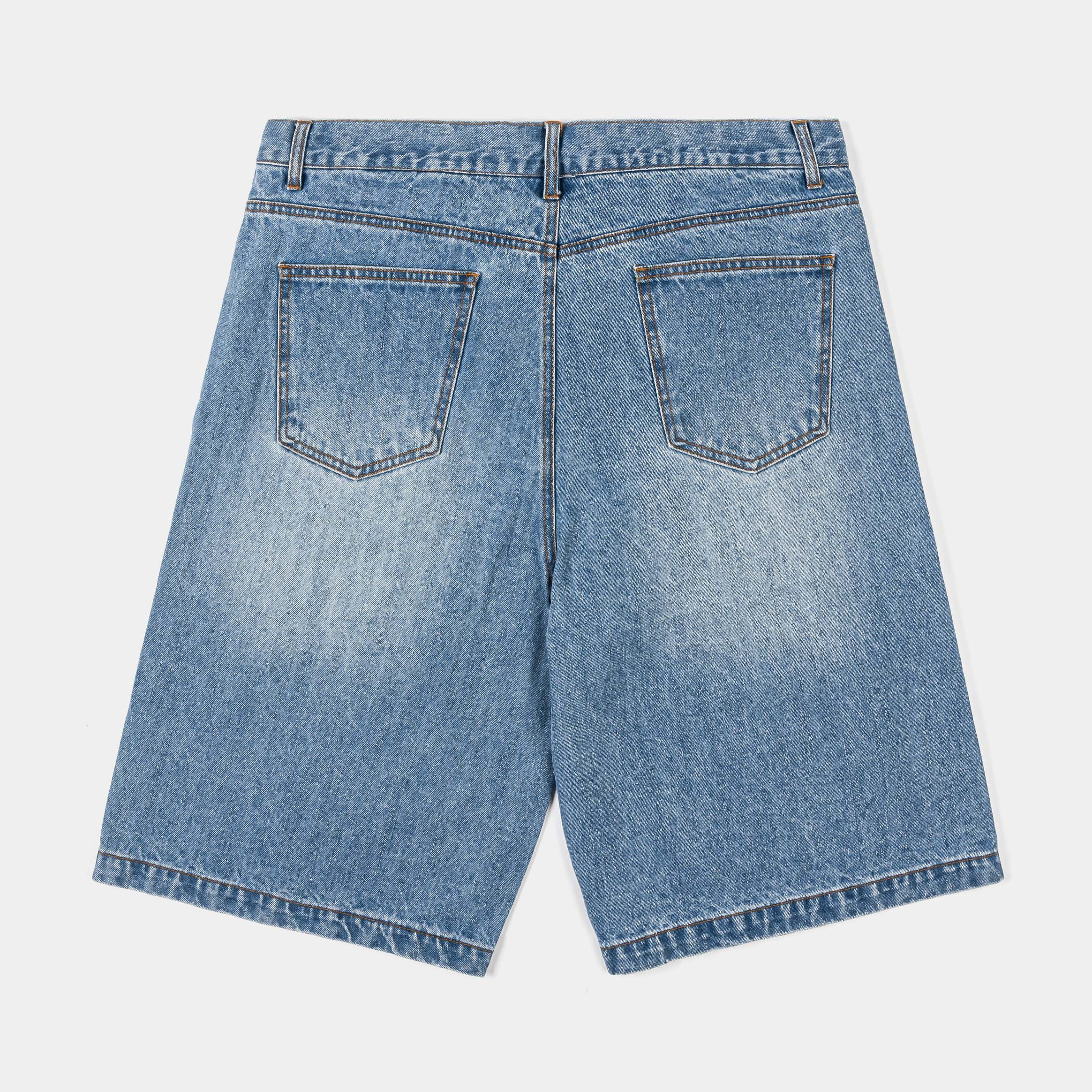 Denim shorts with graphic prints and distressed details.